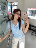 Chic Design Colliding Color Splicing Button Fake Two Short-Sleeved T-Shirt Women 2026 Summer New Unique Repair Body