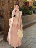 French Atmosphere-Sensitive Oil Painting Sling Dress Women's 2026 Summer New Seaside Wind Fold Mesh Dress