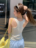 Summer Small Blue Flower Dye Irregular Hem Sling Sling Vest Women 2026 New Folded Waist Design Blouse