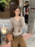 Solid Color Shoulder V-Neck Long-Sleeved Knitted Shirt Woman 2026 Autumn New Body To Close The Waist And Put On The Bottom Shirt Top