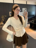 French Small Fragrant Wind Collared Wooden Ear Knitting Bottom Cardigan Women 2026 Autumn And Winter Harvest Waist Thin Inside Sweater