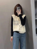 Korean Literary And Artistic Temperament Knitted Vest Vest Women Spring And Autumn Folded Through The Horse Clip Niche Design Sweater Shoulder