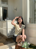 Ultra-Skinny Color Fake Two Buttons V-Neck Short-Sleeved T-Shirt Sweetly Reduce The Age Of The Right Shoulder With The Temperament Blouse