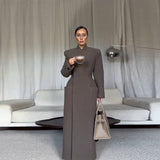 In The Autumn And Winter Of 2025, The New Female Style Style Elegant Cushion Shoulder Long Coat Woman