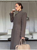 In The Autumn And Winter Of 2025, The New Female Style Style Elegant Cushion Shoulder Long Coat Woman