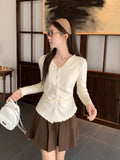 French Small Fragrant Wind Collared Wooden Ear Knitting Bottom Cardigan Women 2026 Autumn And Winter Harvest Waist Thin Inside Sweater