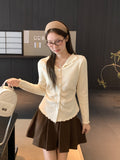French Small Fragrant Wind Collared Wooden Ear Knitting Bottom Cardigan Women 2026 Autumn And Winter Harvest Waist Thin Inside Sweater
