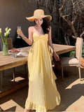 French Beautiful Yellow Sling Dress Woman's Tide 2026 New Seaside Holiday Sexy Bare Back Irregular Dress
